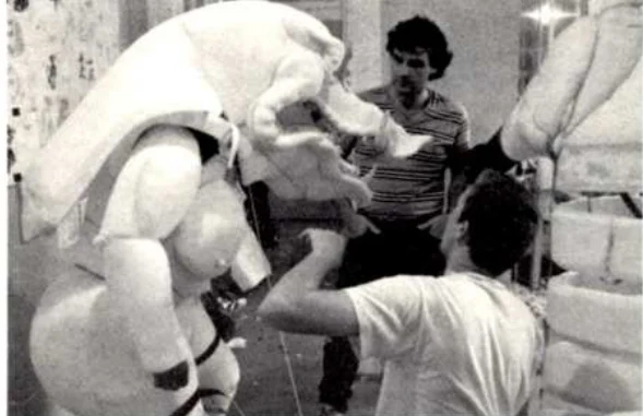 Peter Jackson and puppet builder Richard Taylor inspecting Cedric the Boar — from the original Cinefantastique pages